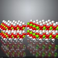 Molecular Structure Model with Red Green White Spheres Arranged in Stacked Layers