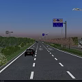 Municipal Road With Vehicles Driving Street Lamps Traffic Signs Green Belts Trees And Pink Flowers