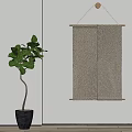 Woven Textured Wall Decor on White Wall with Green Leaf Plant in Gray Pot