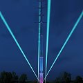 Tall Road Infrastructure Illuminated with Purple Lights Against Night Sky with Flying Bird
