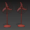 Two Vintage Standing Electric Fans With Brown And Blue Bases And Metal Grills