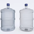Two Large Transparent Water Bottles With Blue Caps And Stackable Design For Drinking Water Storage