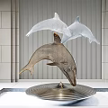 Decorative Golden And White Mesh Dolphin Sculpture With Circular Wave Pattern Base On Striped Wall