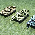 Three Military Tanks On Green Grass Field With Camouflage Patterns