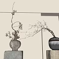 Ceramic And Striped Vases With White Blooms On Stone And Wooden Bases Against Neutral Wall