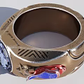 Unique Golden Ring With Large Blue Gemstone And Intricate Engraved Wing Decorations