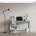 Gray Office Desk Setup With Ergonomic Chair Laptop Clock Binders Flower Vase And Floor Lamp