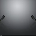 Two Microphones Used By Performers On Shiny Surface With Reflection And Overhead Light