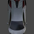 Sleek Silver Gray Supercar With Aerodynamic Body Black Rear Spoiler And Red Brake Calipers