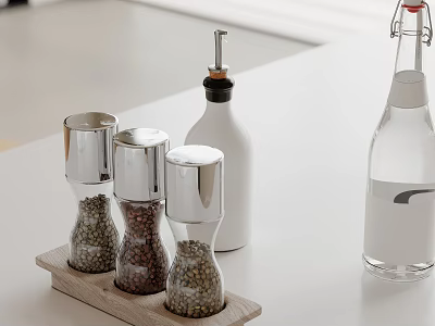 Kitchen Countertop Setup With Silver Pepper Grinders Wooden Tray Oil And Water Bottles 3d model