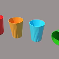 Colorful Plastic Cups With Wavy Texture One Tipped Over Red Orange Blue Green