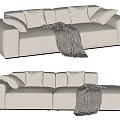 Cozy Beige Double Sofa with Soft Cushions and Black White Striped Blanket