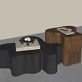 Modern Black and Brown Irregular Shaped Coffee Tables with Books and Small Items