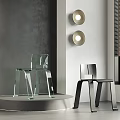 Transparent Acrylic And Black Metal Accent Chairs In Modern Grey Room With Round Wall Lights