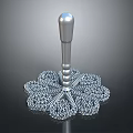 Ornate Metallic Weapon With Intricate Filigree Base And Silver Handle Design
