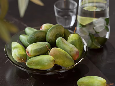 Fresh Green Mangoes In Glass Bowl With Water Glass And Lime Ice Cubes On Table 3d model