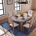 Round Dining Table Set with Six Wooden Chairs White Cushioned and Vase on Blue Rug
