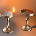 Two Metallic Vintage Candle Holders With Lit Flame For Indoor Decor
