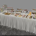 Elegant Food Display Table With Various Desserts Floral Decor And White Tablecloth