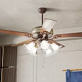 Ceiling Fan with Wooden Blades Decorative Lampshades and Crystal Decorations in Indoor Space