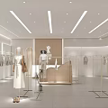 Modern Clothing Store Interior Design With Mannequins Clothing Racks And Decorative Plants