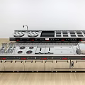 Professional Commercial Kitchen Interior With Stainless Steel Workstation Stovetops Cabinets And White Walls