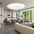Modern Dining Living Room With Natural Light Large Windows Blinds Round Table And Wicker Chairs