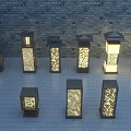 Outdoor Lights By Stone Wall On Tile Floor With Lantern Square Shapes Hollowed Patterns Glowing