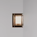 Modern Square Wall Light With Brass Metal Frame And Transparent Shade On Gray Corner Wall