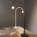 Modern Curved Table Lamps White Black Round Bulb On Wooden Table Gray Wall Soft Shadows
