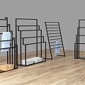 Black Metal Display Racks with Folded Fabrics and Box in Modern Design on Wooden Floor