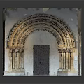 Ancient Historical Architecture Featuring Intricate Arched Doorway With Carved Columns