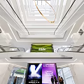 Front Desk Reception In Modern Spacious Lobby With Glass Walls Yellow Accents People Interacting