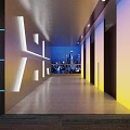 Modern Elevator Hallway With Illuminated Wall Panels Colorful Lighting And City View