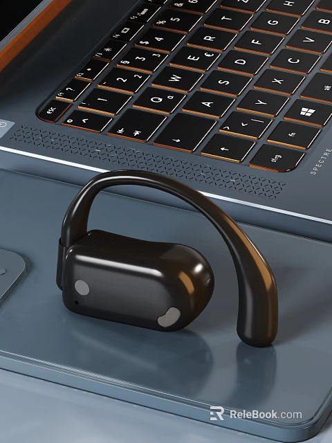Black Bone Conduction Headphones Near Laptop And Mouse On Desk 3d model 