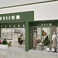 Modern Green Facade Clothing Store With Mannequins Window Displays And Lighting