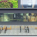 Outdoor Bicycle Parking Area With Metal Racks And Multiple Bikes Near Glass Building