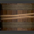 Wooden Washing Bucket with Rope Wrapped Design and Blue Liquid Inside for Daily Cleaning
