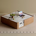 Modern Coffee Table With Marble Top Wooden Base And Green Apples Laptop In Living Room
