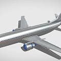 Silver Colored Commercial Airplane With Blue Engines