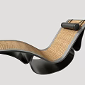 Modern Rattan Lounge Chair With Curved Black Frame And Woven Backrest