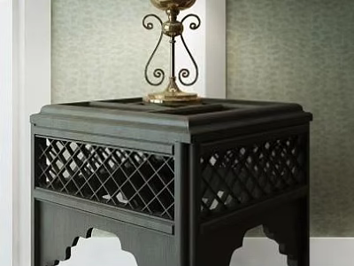 Black Side Table with Lattice Design and Decorative Legs Topped with Ornate Metal Ornament 3d model