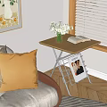Living Room Side Table with Flower Vase Book Sofa Pillows and Window Blinds