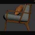Light Blue Chair With Wooden Legs Armrests And Orange Pillow On Cushioned Seat