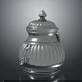 Ornate Carved Silver Lidded Container With Decorative Patterns And Spire Top