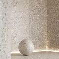Terrazzo Wall With Color Swatches Display And Decorative Sphere In Various Tones