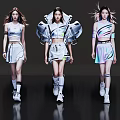 Three Women Walking In Stylish Modern Futuristic Outfits With Unique Shoulder Design And Colorful Details
