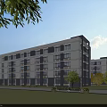 Modern Multi Story Industrial Factory Building With White Gray Walls And Surrounding Greenery