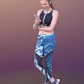 Woman in CrossFit Athletic Tank Top Wearing Blue Workout Leggings Holding Smartphone and Earphones