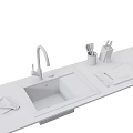 Modern Black Kitchen Sink with Faucet Cutting Board and Utensils on Countertop